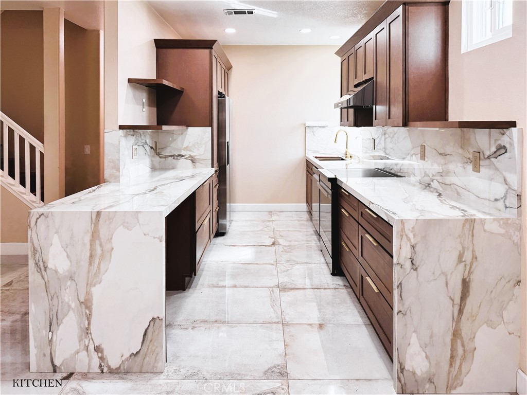 312 Torito Lane Diamond Bar, CA 91765 - Photo 4 of 20 a bathroom with a sink and a mirror
