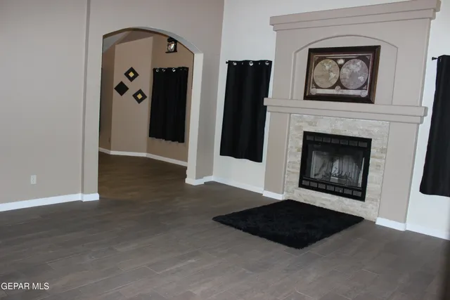 a kitchen with a sink and a refrigerator