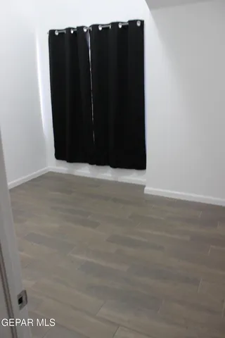 a kitchen with stainless steel appliances a refrigerator and a stove