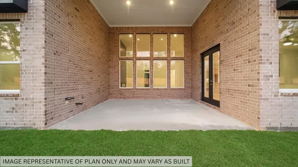 a view of an front door and yard