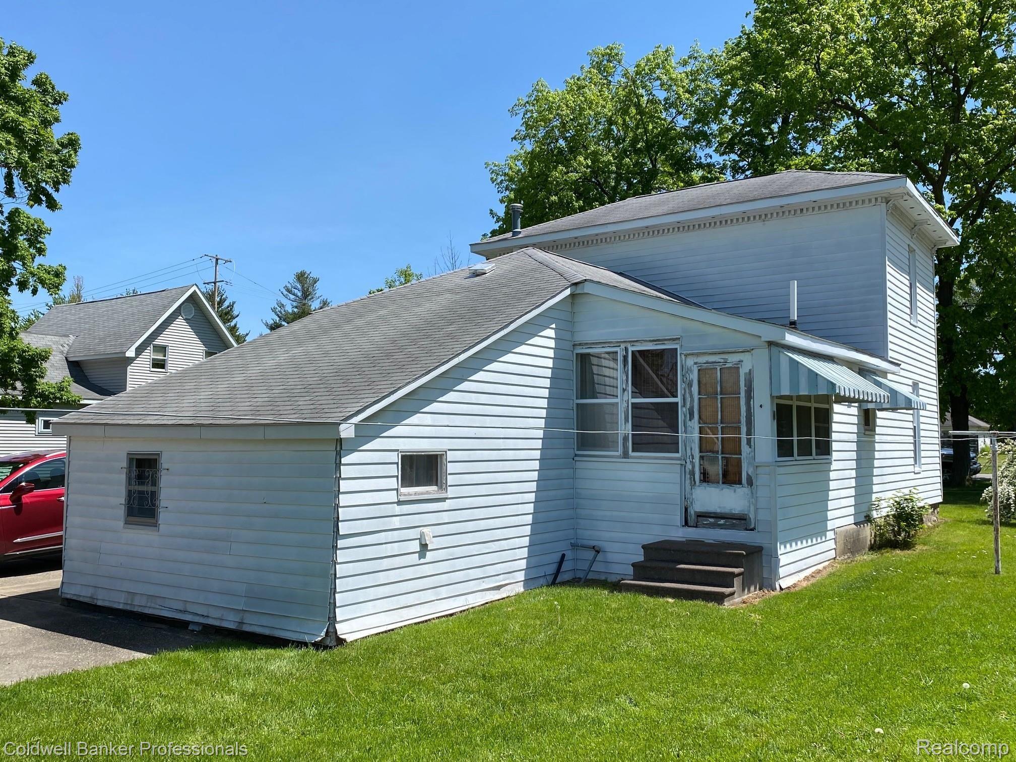 133 North Morrice Road Morrice, MI 48857 - Photo 14 of 16 14 133 Back of Home.jpg