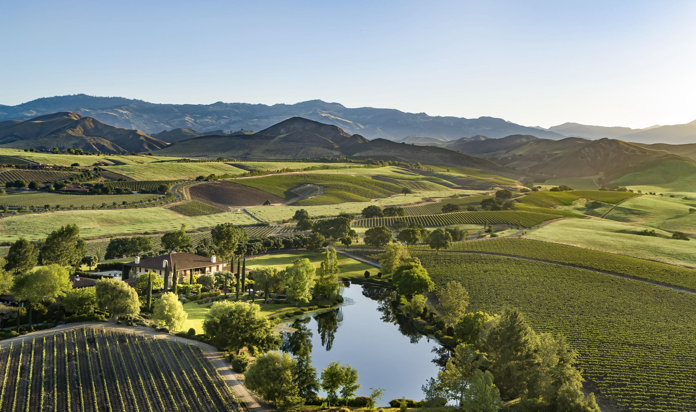 a view of an aerial view of residential houses with outdoor space