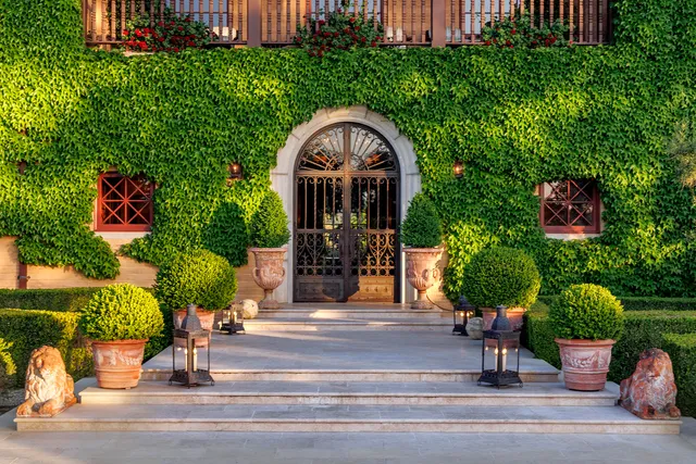 a view of a golf course with a big yard