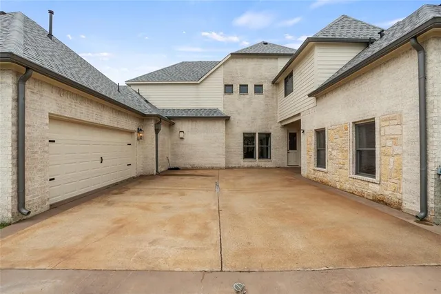 a view of a house with a garage
