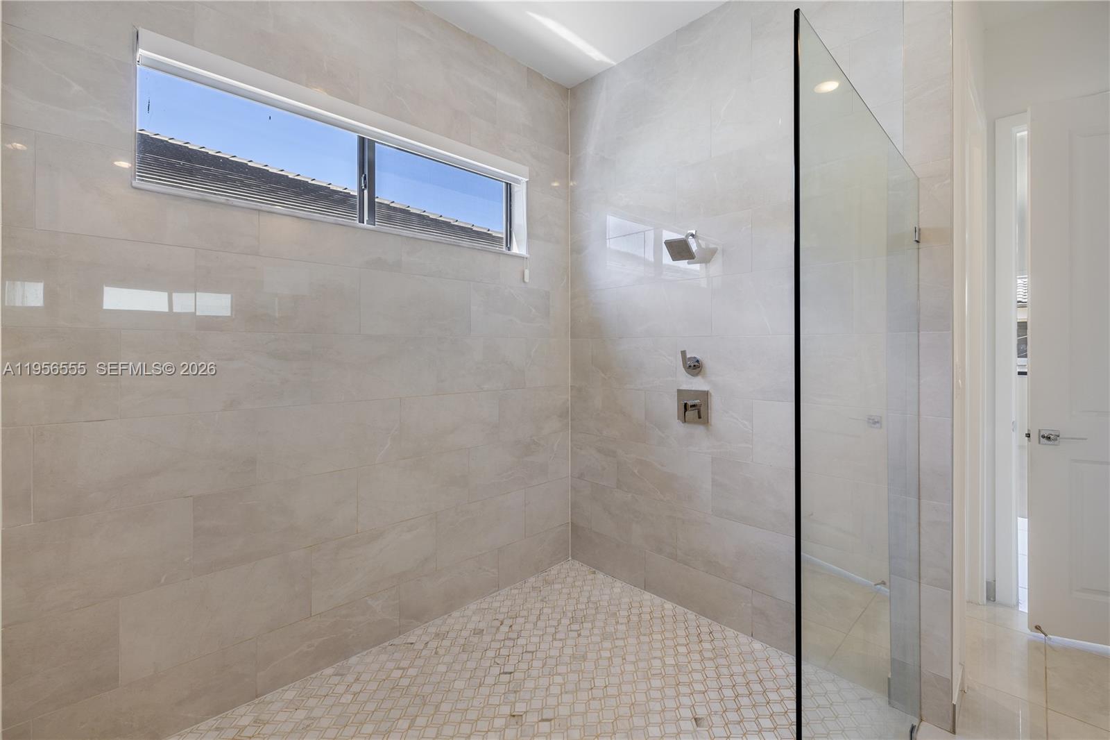 17665 Southwest 46th Street Miramar, FL 33029 - Photo 19 of 41 a bathroom with a shower