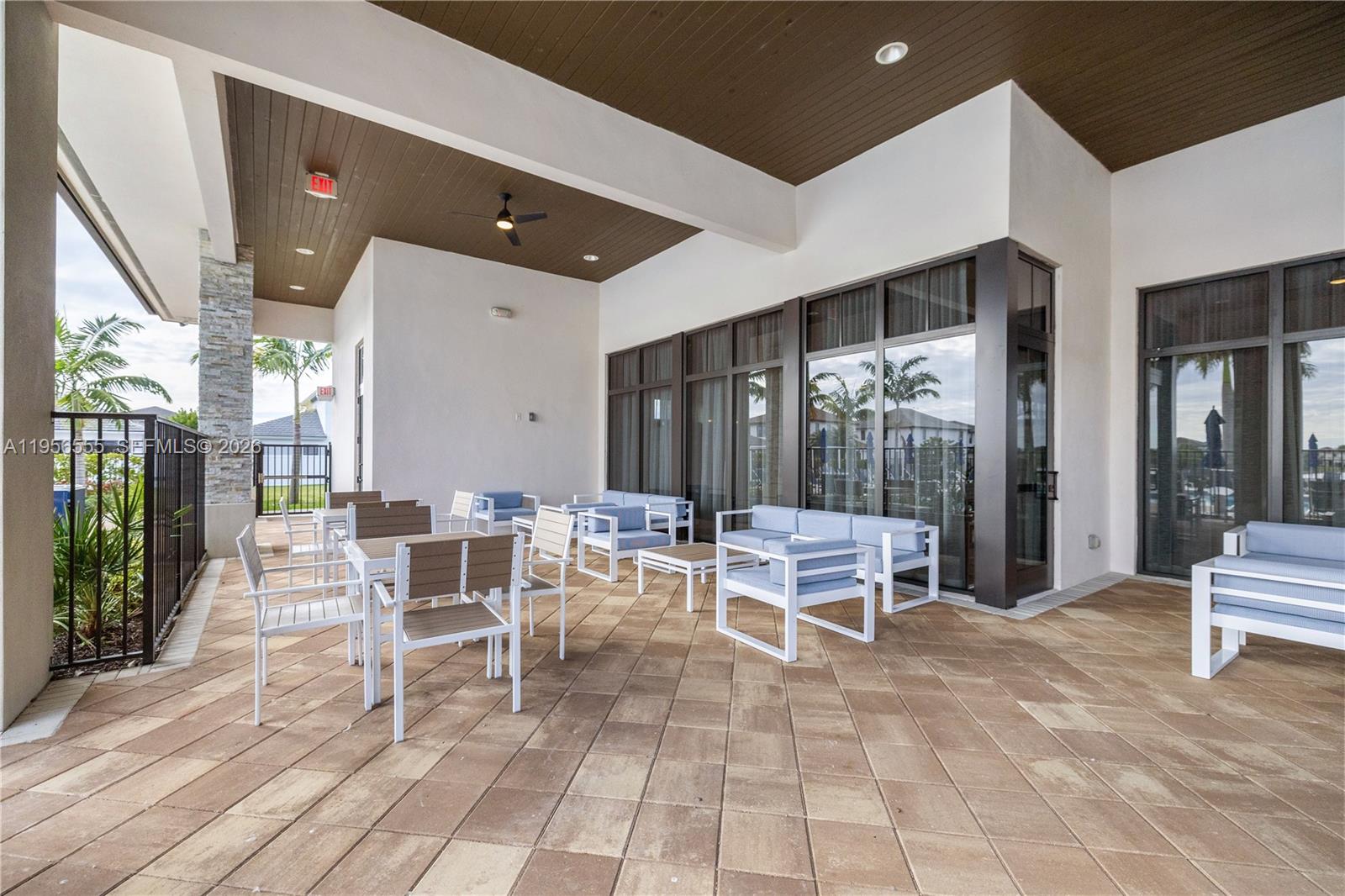17665 Southwest 46th Street Miramar, FL 33029 - Photo 32 of 41 a building outdoor space with patio furniture and potted plants