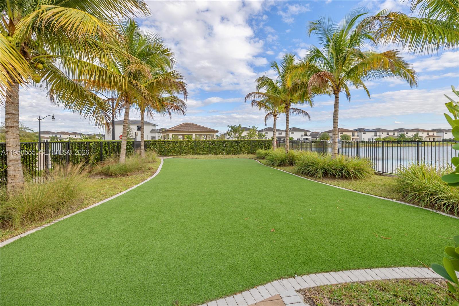 17665 Southwest 46th Street Miramar, FL 33029 - Photo 33 of 41 a view of a lake with a palm trees