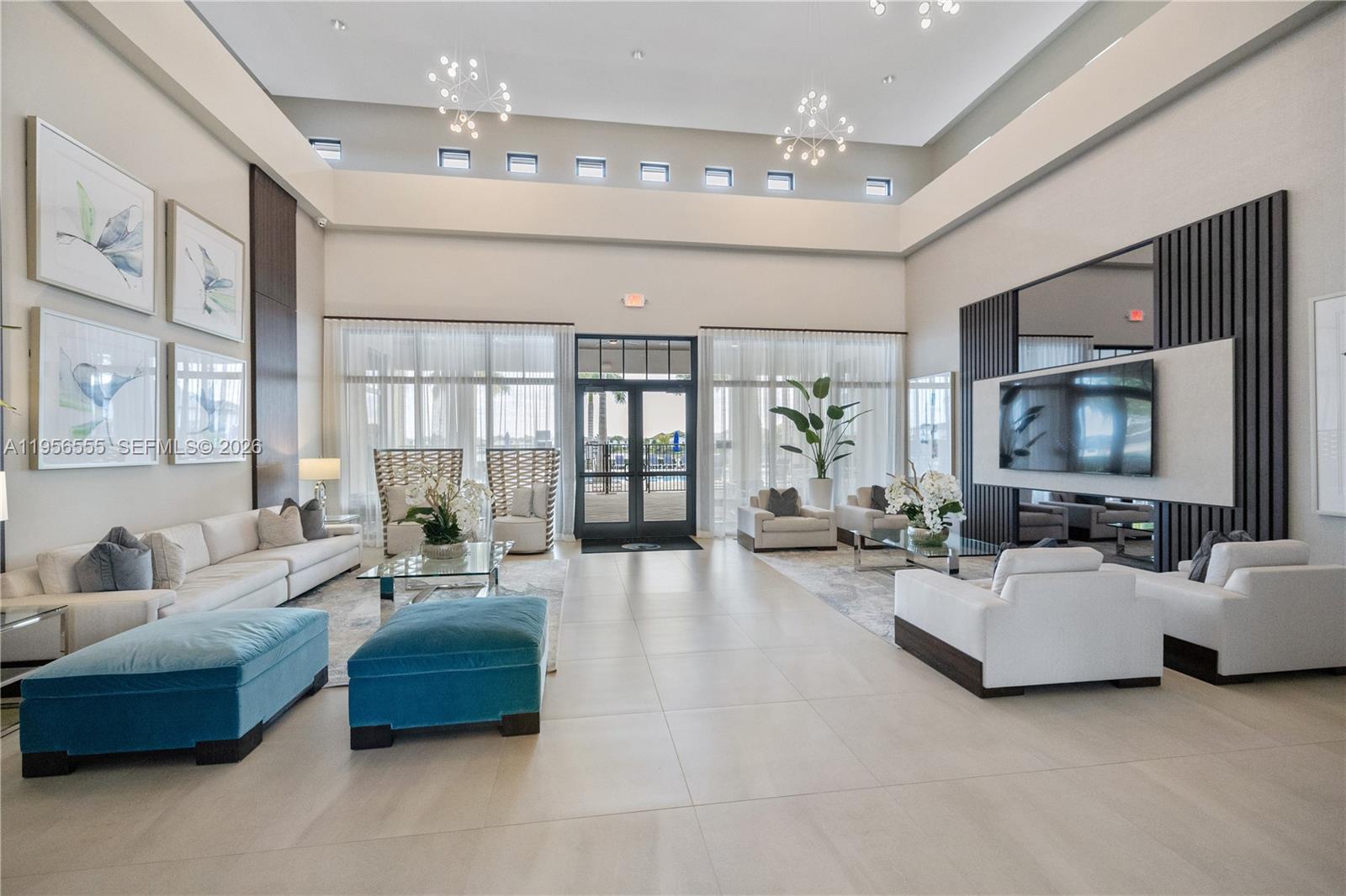 17665 Southwest 46th Street Miramar, FL 33029 - Photo 35 of 41 a living room with furniture and a flat screen tv