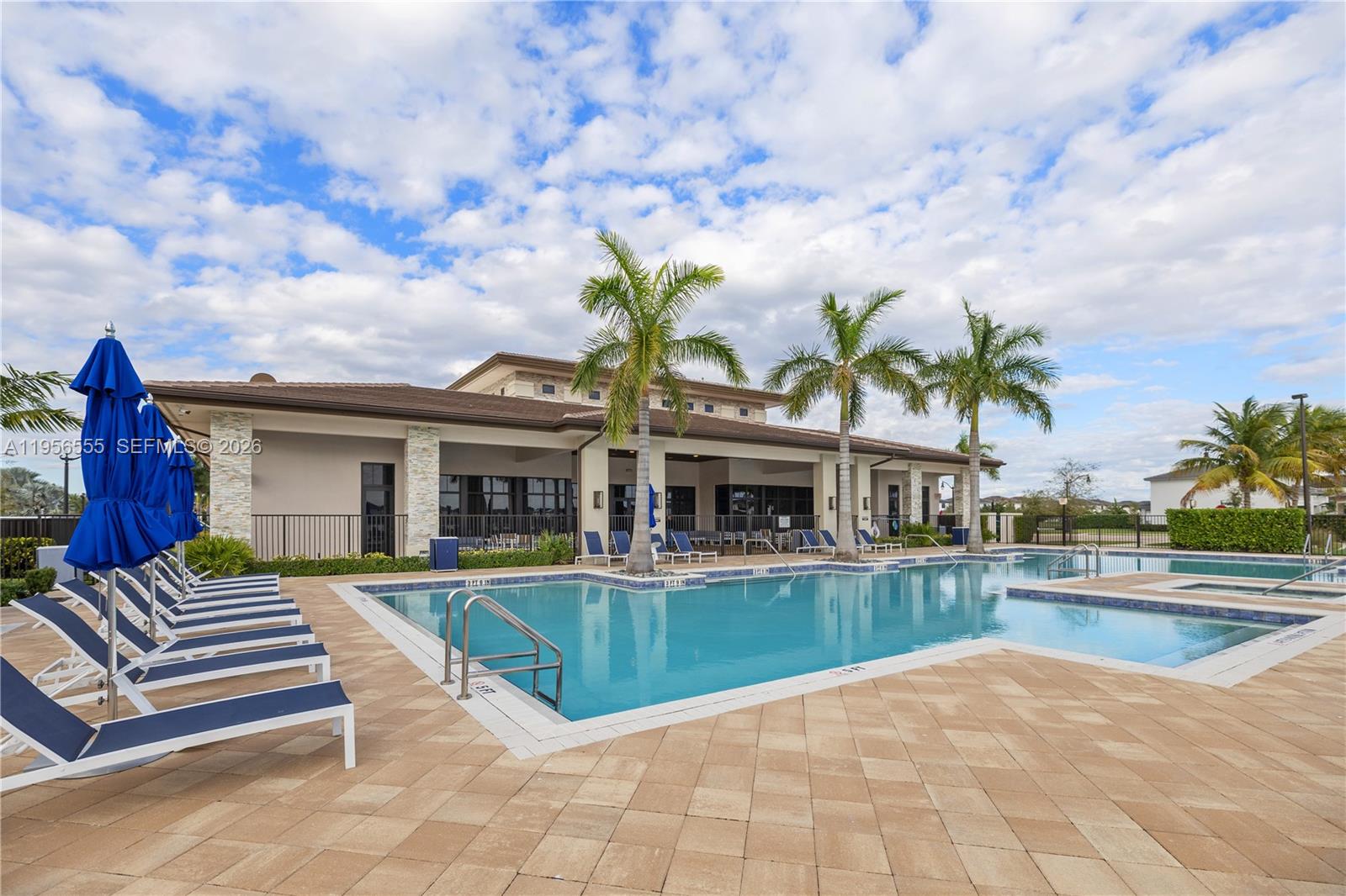 17665 Southwest 46th Street Miramar, FL 33029 - Photo 37 of 41 a view of a house with a swimming pool and sitting area