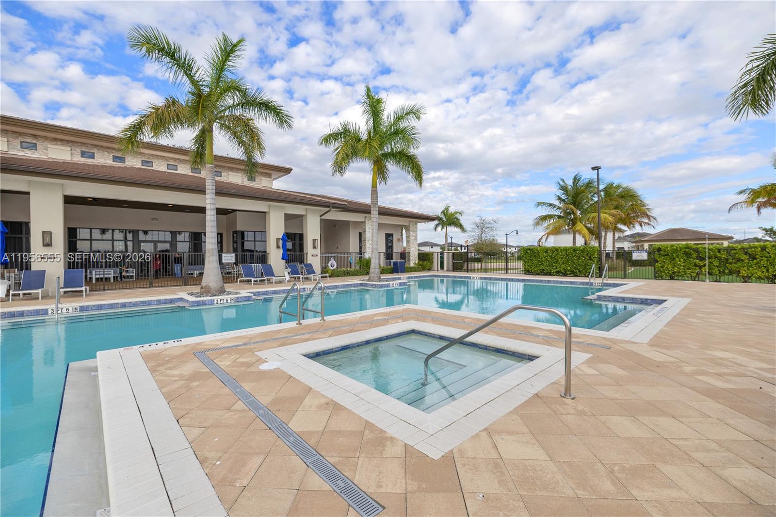 17665 Southwest 46th Street Miramar, FL 33029 - Photo 38 of 41 a view of a house with swimming pool and sitting area