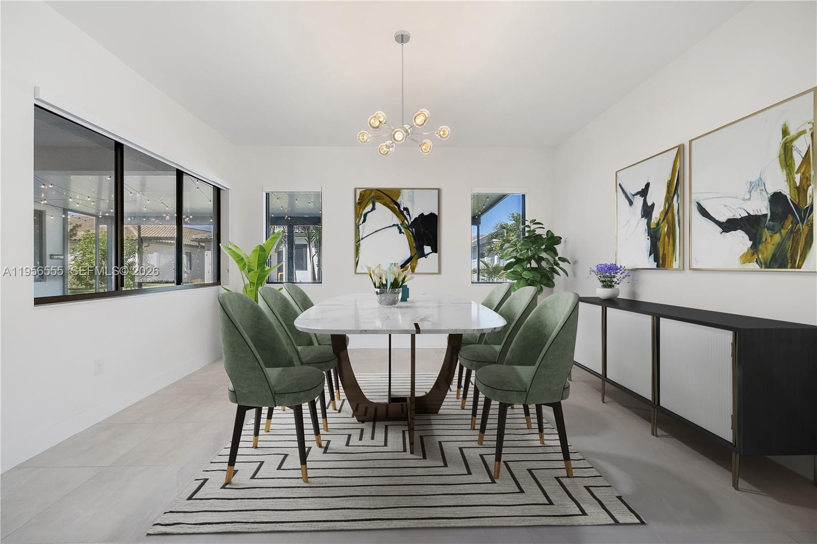 17665 Southwest 46th Street Miramar, FL 33029 - Photo 5 of 41 a view of a dining room with furniture window and wooden floor