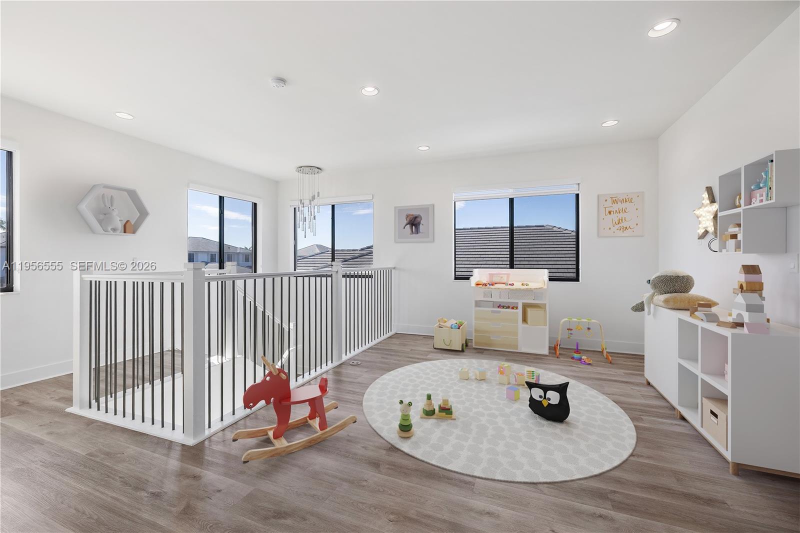 17665 Southwest 46th Street Miramar, FL 33029 - Photo 9 of 41 a living room with furniture and a flat screen tv