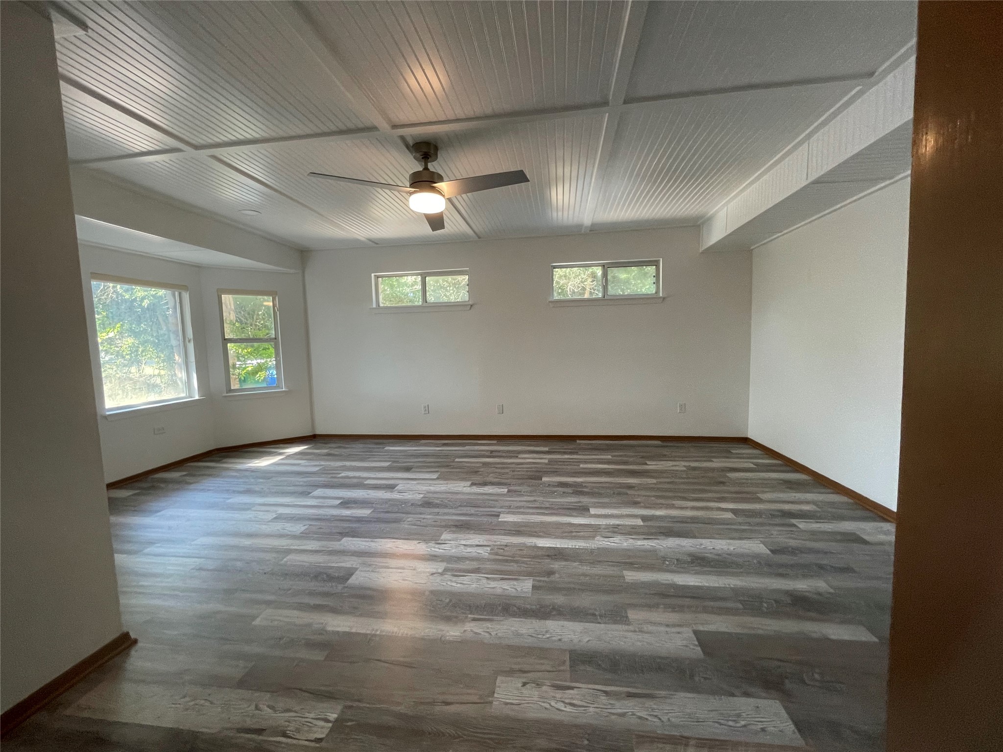 5802 Longhorn Landing Austin, TX 78734 - Photo 26 of 38 Spare room with dark wood finished floors and ceiling fan