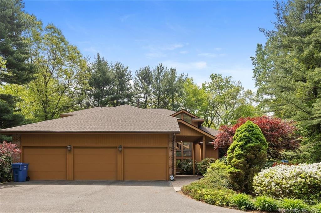 84 Thompson Road Avon, CT 06001 - Photo 1 of 1 Driveway entrance to 3-stall garage