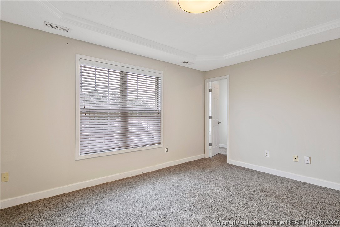 89 Rockingham Street Spring Lake, NC 28390 - Photo 19 of 41 a view of an empty room with a window