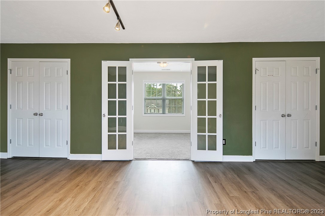89 Rockingham Street Spring Lake, NC 28390 - Photo 35 of 41 a view of an entryway with wooden floor