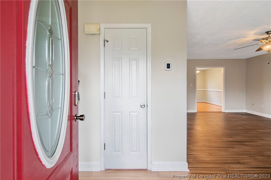 89 Rockingham Street Spring Lake, NC 28390 - Photo 4 of 41 a view of a bathroom with a shower and mirror