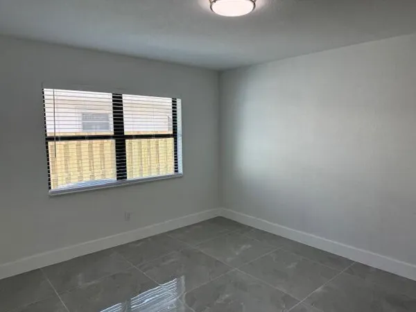 an empty room with a window
