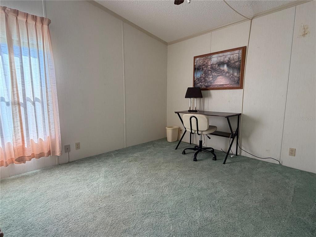 208 Eagle Punta Gorda, FL 33950 - Photo 14 of 16 a workspace with furniture and a window