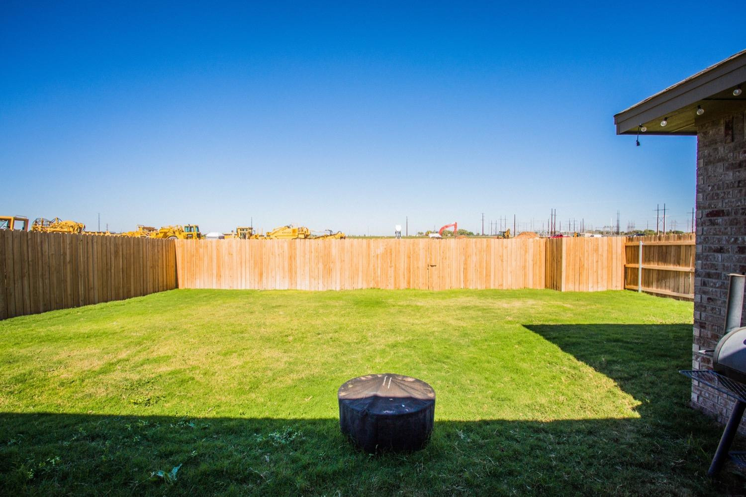 7004 10th Street Lubbock, TX 79416 - Photo 29 of 32 a view of a garden with an outdoor space