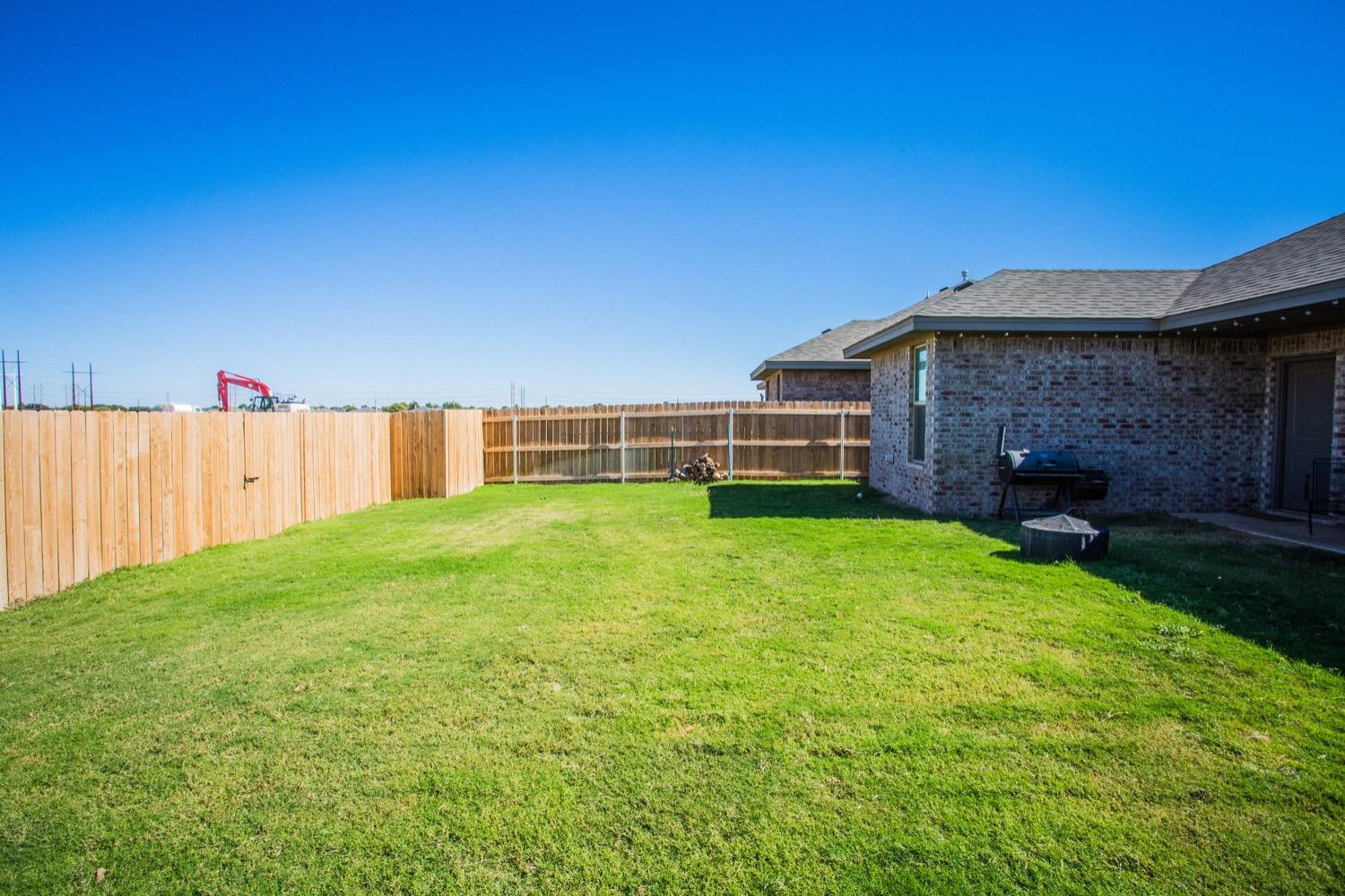 7004 10th Street Lubbock, TX 79416 - Photo 30 of 32 a view of a backyard with a garden