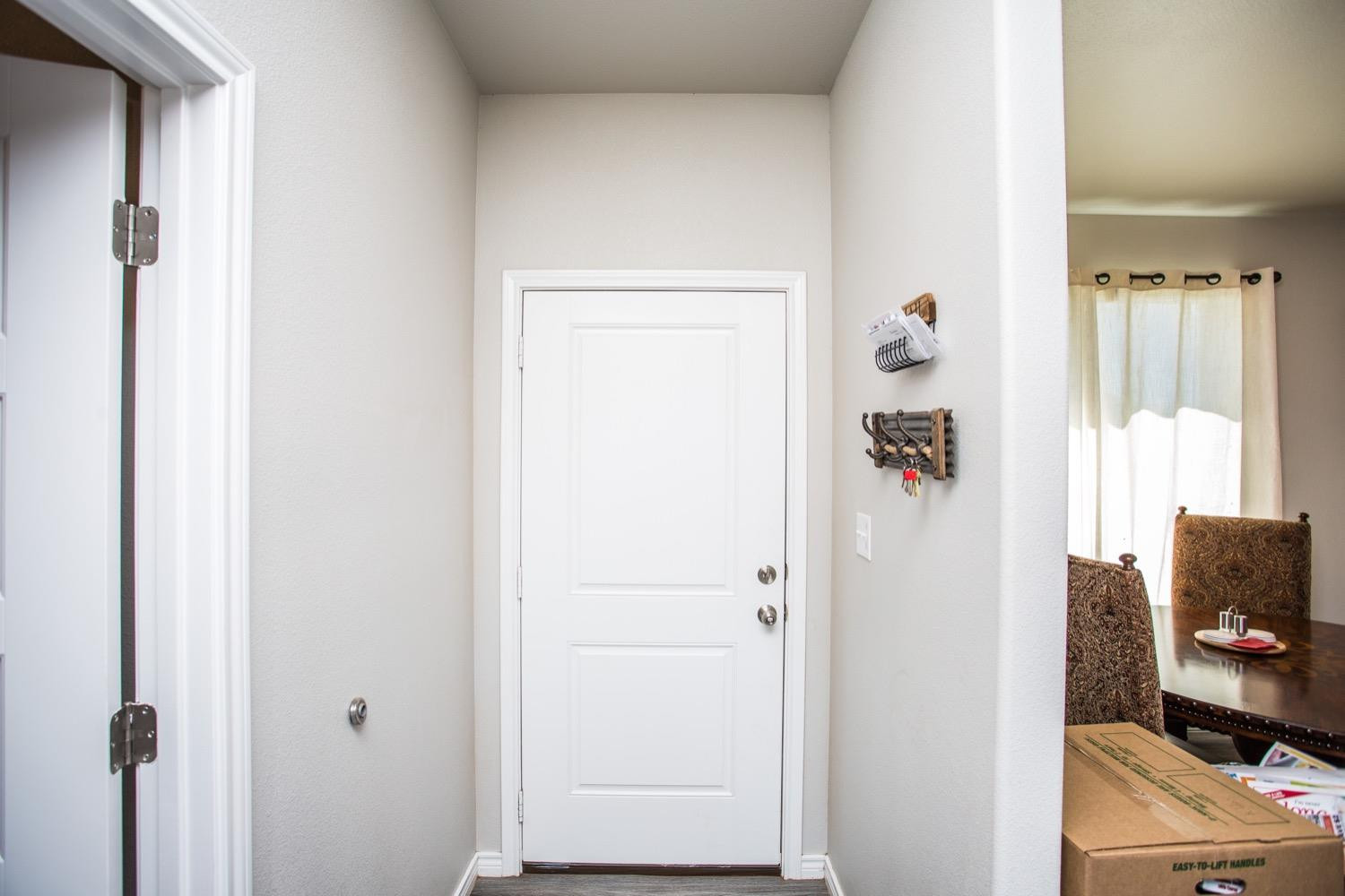 7004 10th Street Lubbock, TX 79416 - Photo 6 of 32 a view of a bedroom with workspace and a window