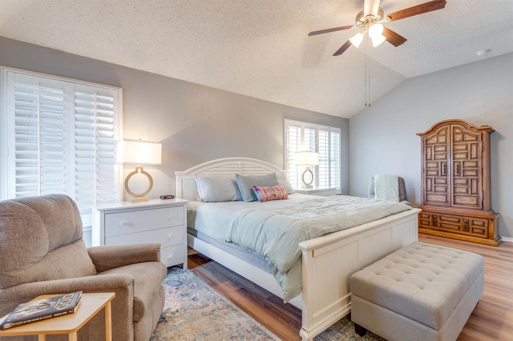 4816 Sleepy Ridge Circle Fort Worth, TX 76133 - Photo 23 of 36 Bedroom featuring wood finished floors and ceiling fan