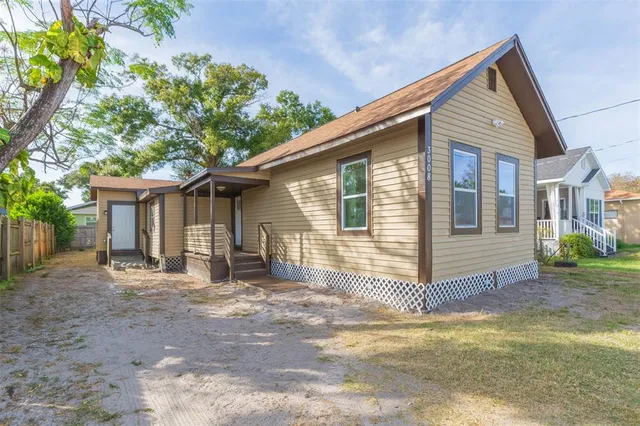 a front view of a house with a patio
