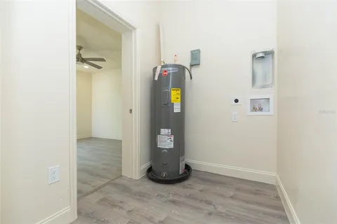 a view of an entryway with wooden floor