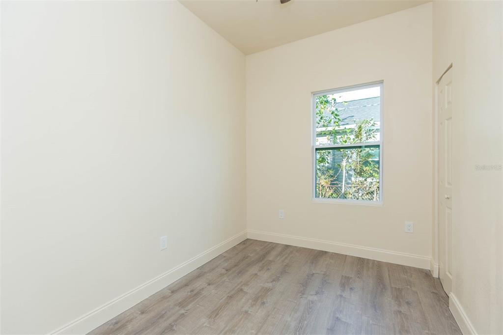 3008 North 17th Street Tampa, FL 33605 - Photo 19 of 28 an empty room with a window