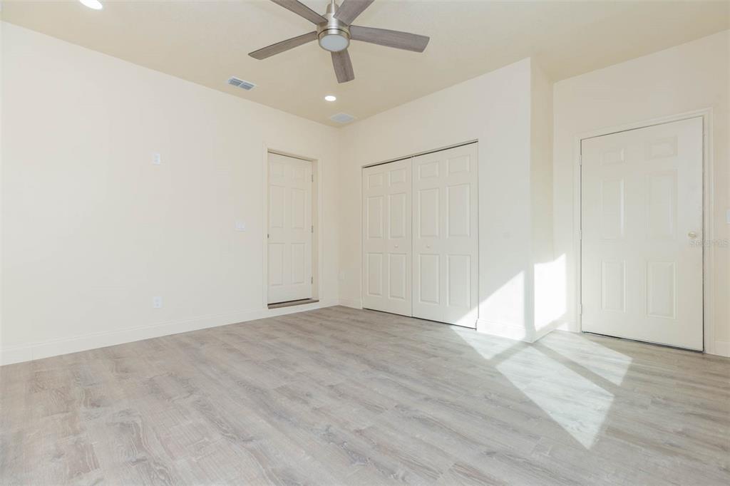 3008 North 17th Street Tampa, FL 33605 - Photo 27 of 28 an empty room with fan and windows