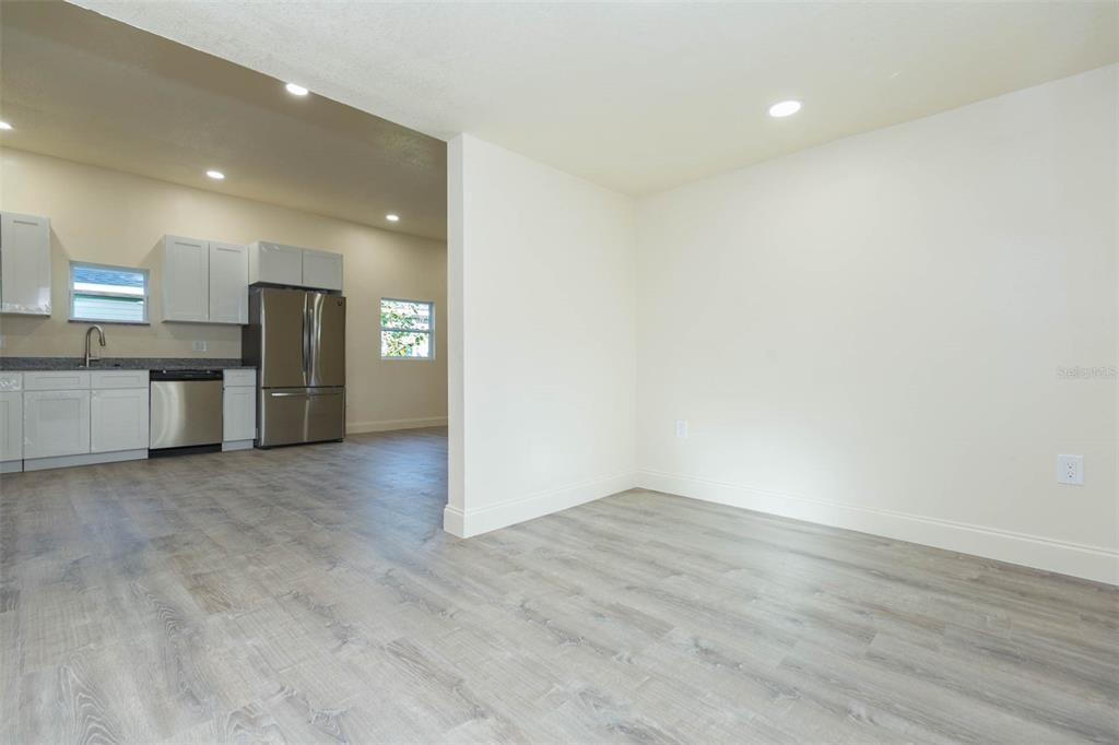 3008 North 17th Street Tampa, FL 33605 - Photo 10 of 28 a view of a kitchen with a sink and a refrigerator