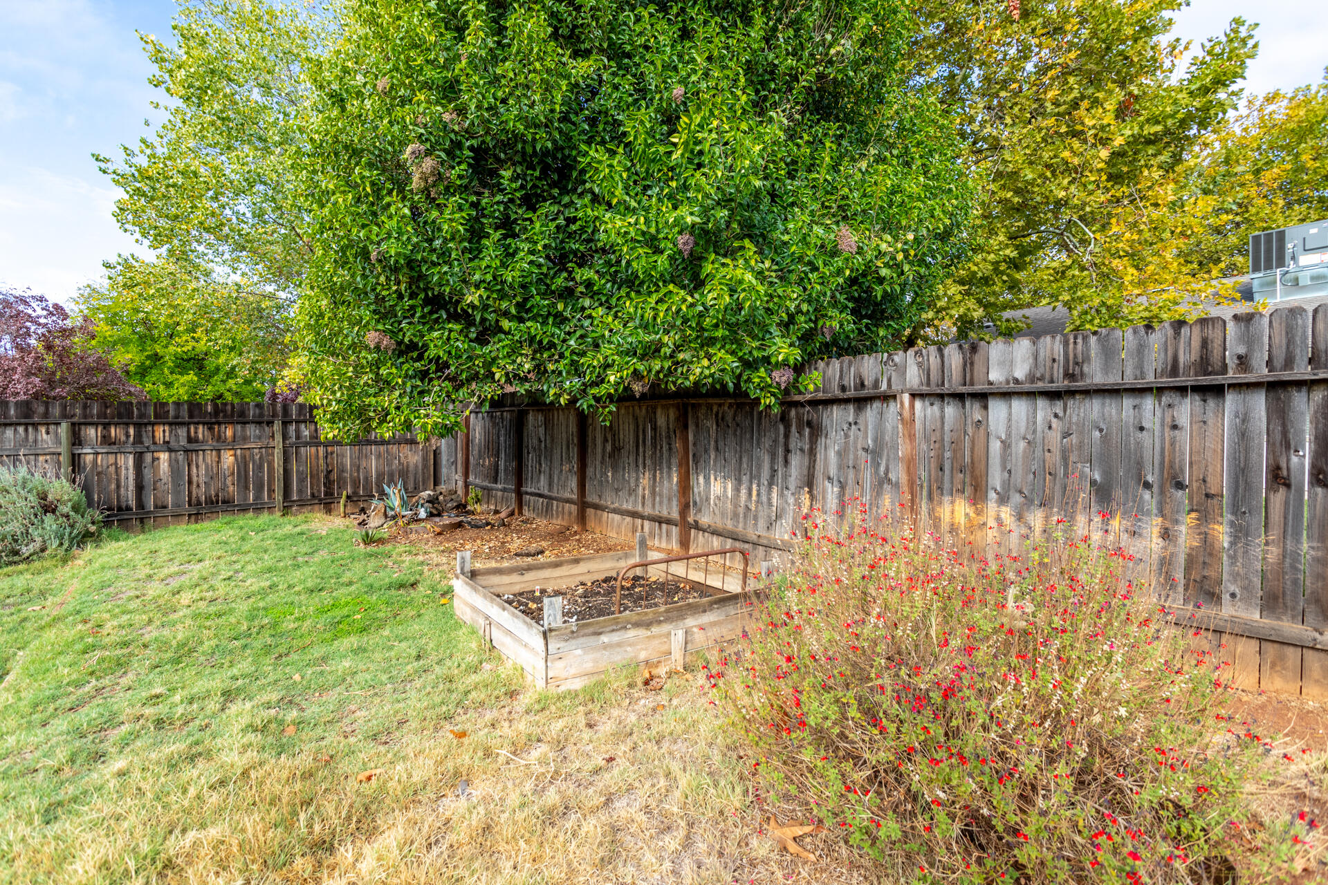 2472 Saturn Redding, CA 96002 - Photo 14 of 15 a view of a house with backyard and sitting area