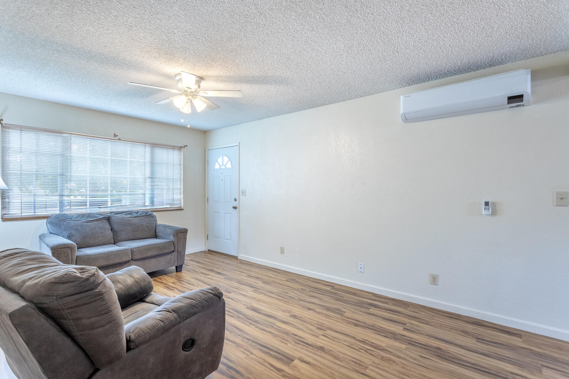 2472 Saturn Redding, CA 96002 - Photo 5 of 15 a living room with furniture and a large window