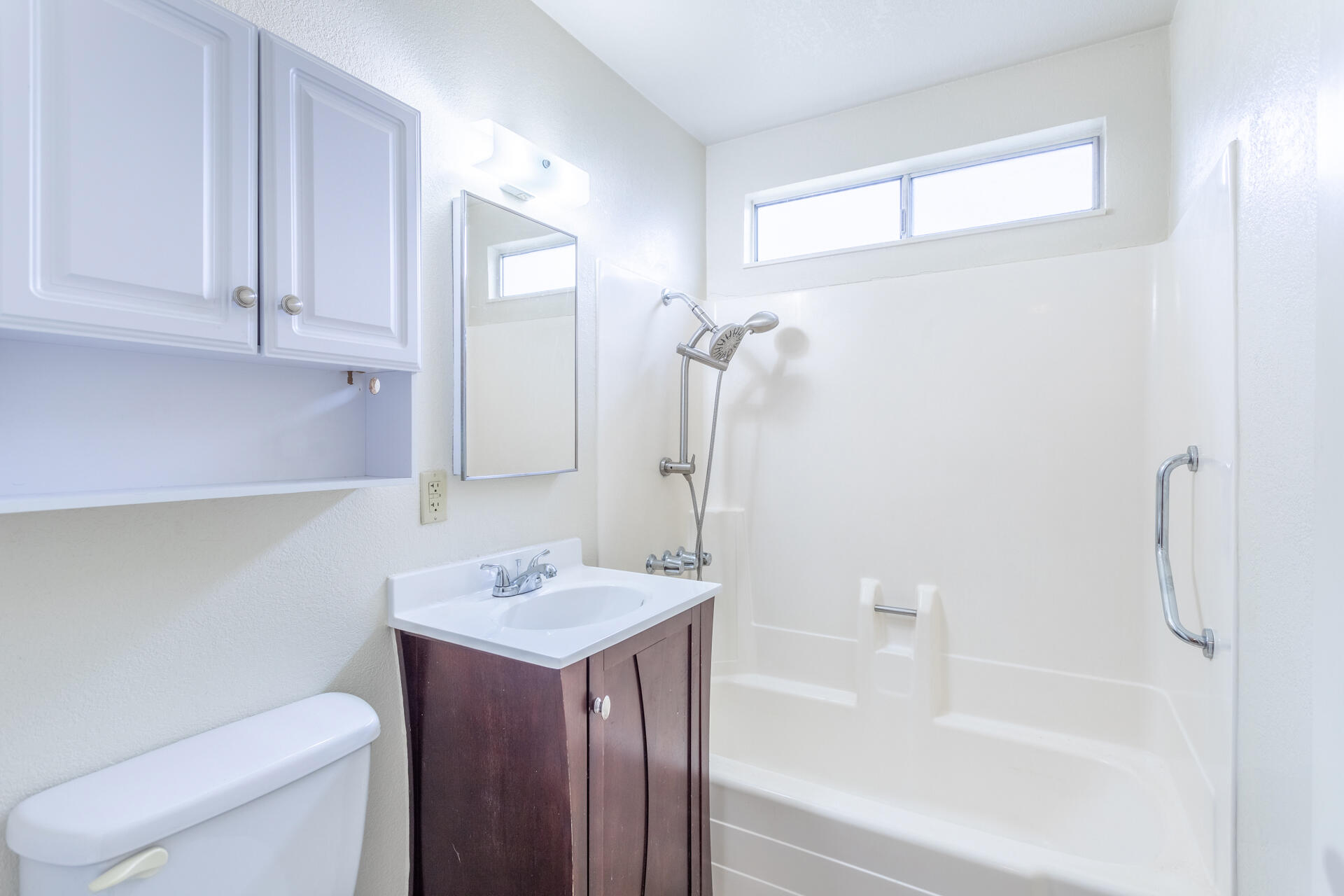 2472 Saturn Redding, CA 96002 - Photo 10 of 15 a bathroom with a sink a toilet and shower