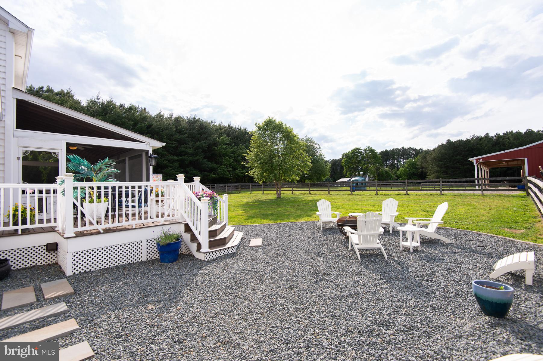 12136 Holly Road Ridgely, MD 21660 - Photo 74 of 136 a view of a chair and table in the patio
