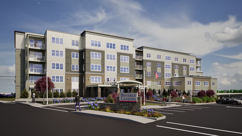 50 Balch Street, Unit 205 Beverly, MA 01915 - Photo 1 of 4 a city street lined with tall buildings