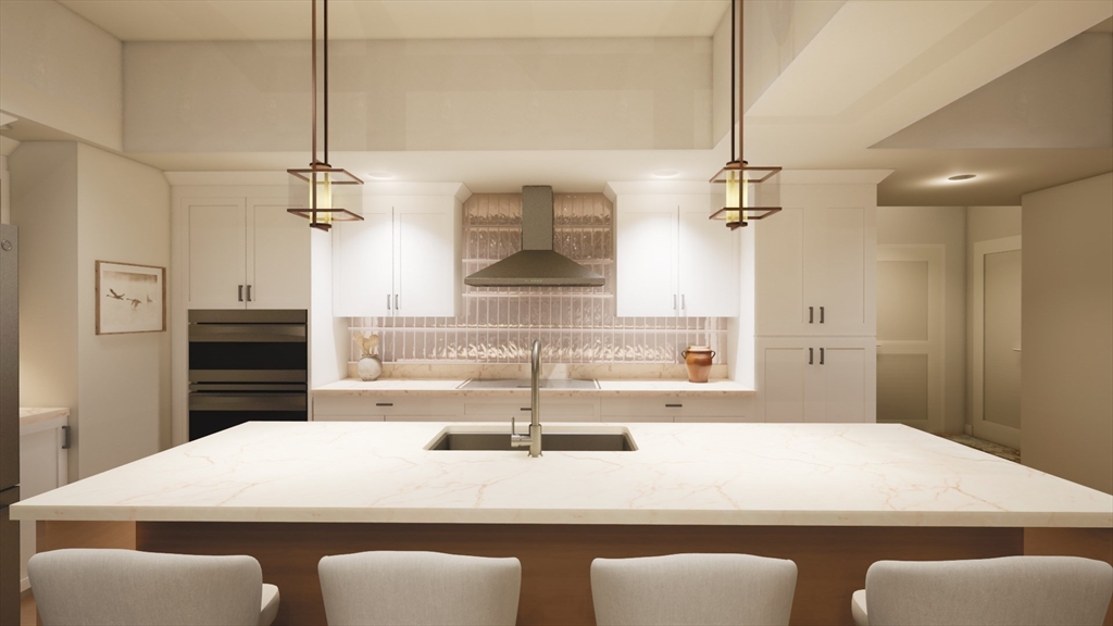 50 Balch Street, Unit 205 Beverly, MA 01915 - Photo 2 of 4 a view of a kitchen counter space a sink and appliances