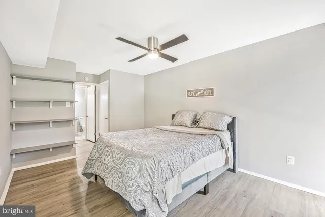 a bedroom with a bed and closet