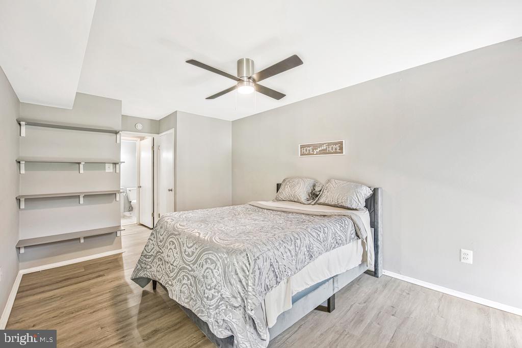 7129 Donnell Place, Unit A District Heights, MD 20747 - Photo 16 of 25 a bedroom with a bed and closet