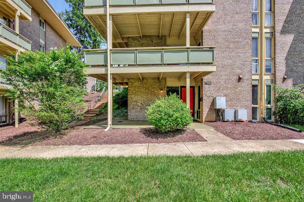 7129 Donnell Place, Unit A District Heights, MD 20747 - Photo 3 of 25 a front view of a house with garden