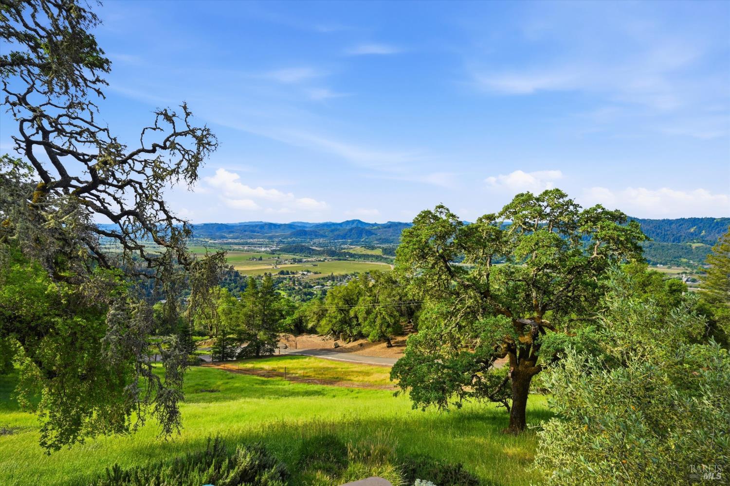 31000 Pine Mountain Road Cloverdale, CA 95425 - Photo 6 of 61 The home’s hilltop orientation captures expansive valley and mountain vistas.