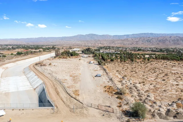 a view of a lake with mountain