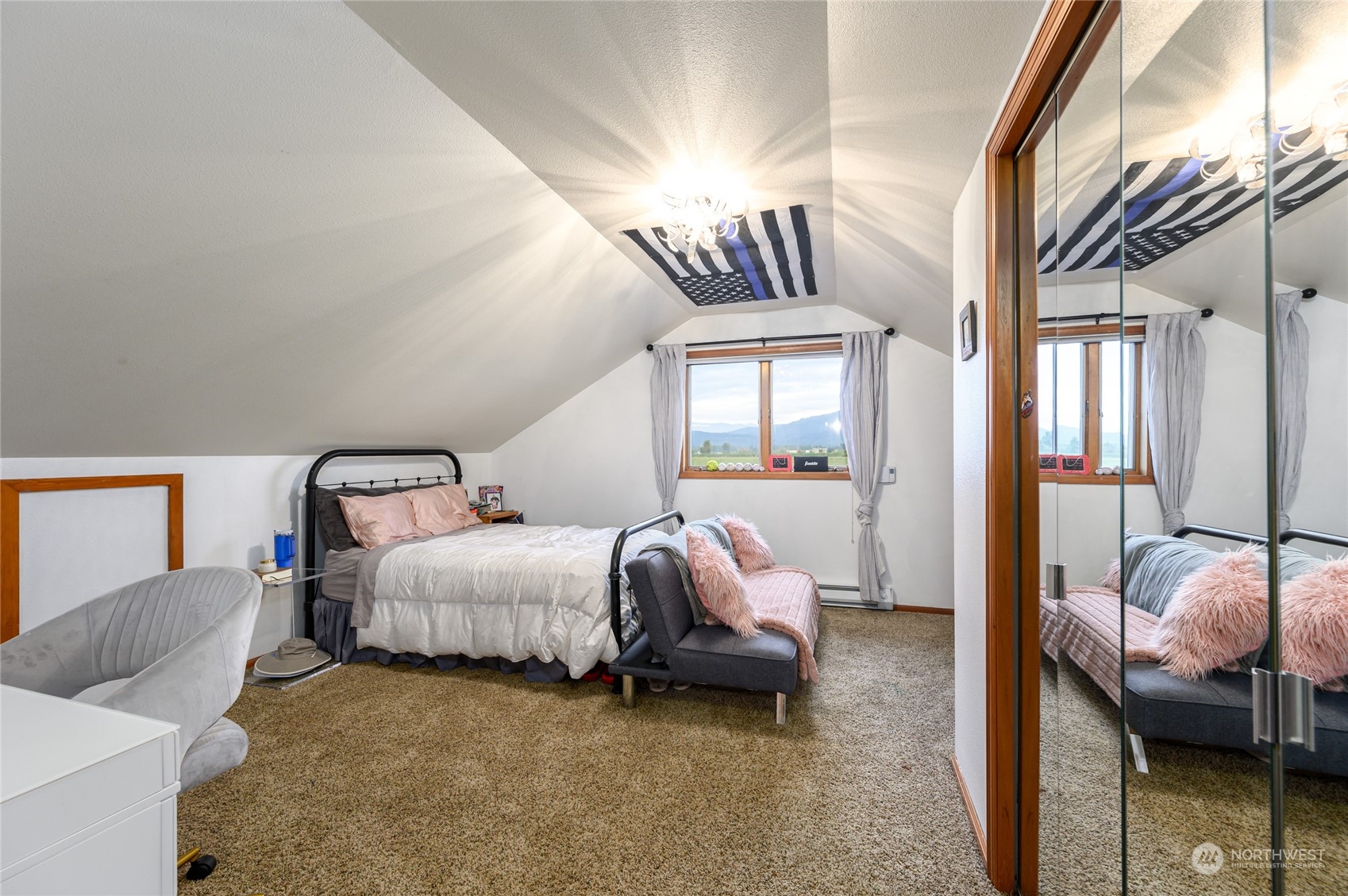 7956 Trapline Road Everson, WA 98247 - Photo 21 of 40 a spacious bedroom with a bed and window