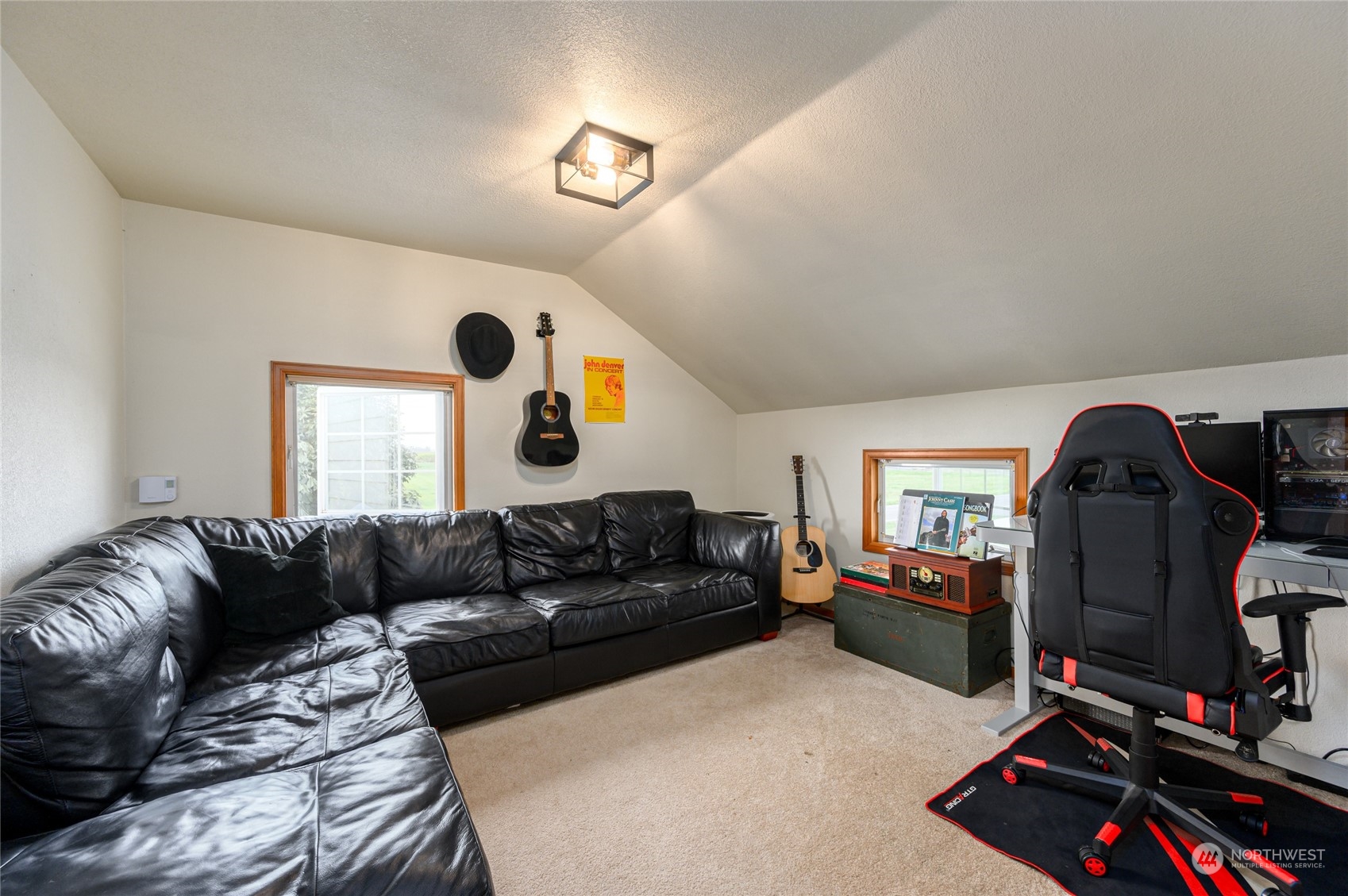 7956 Trapline Road Everson, WA 98247 - Photo 24 of 40 a living room with furniture gym equipment and a window