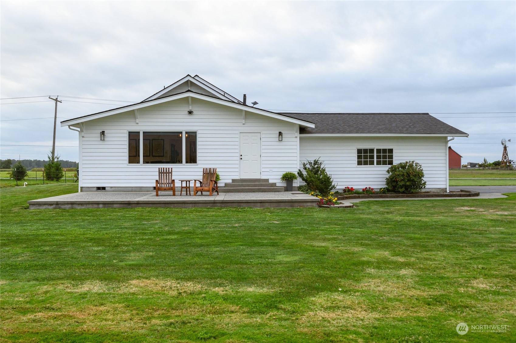 7956 Trapline Road Everson, WA 98247 - Photo 32 of 40 a front view of house with yard and green space