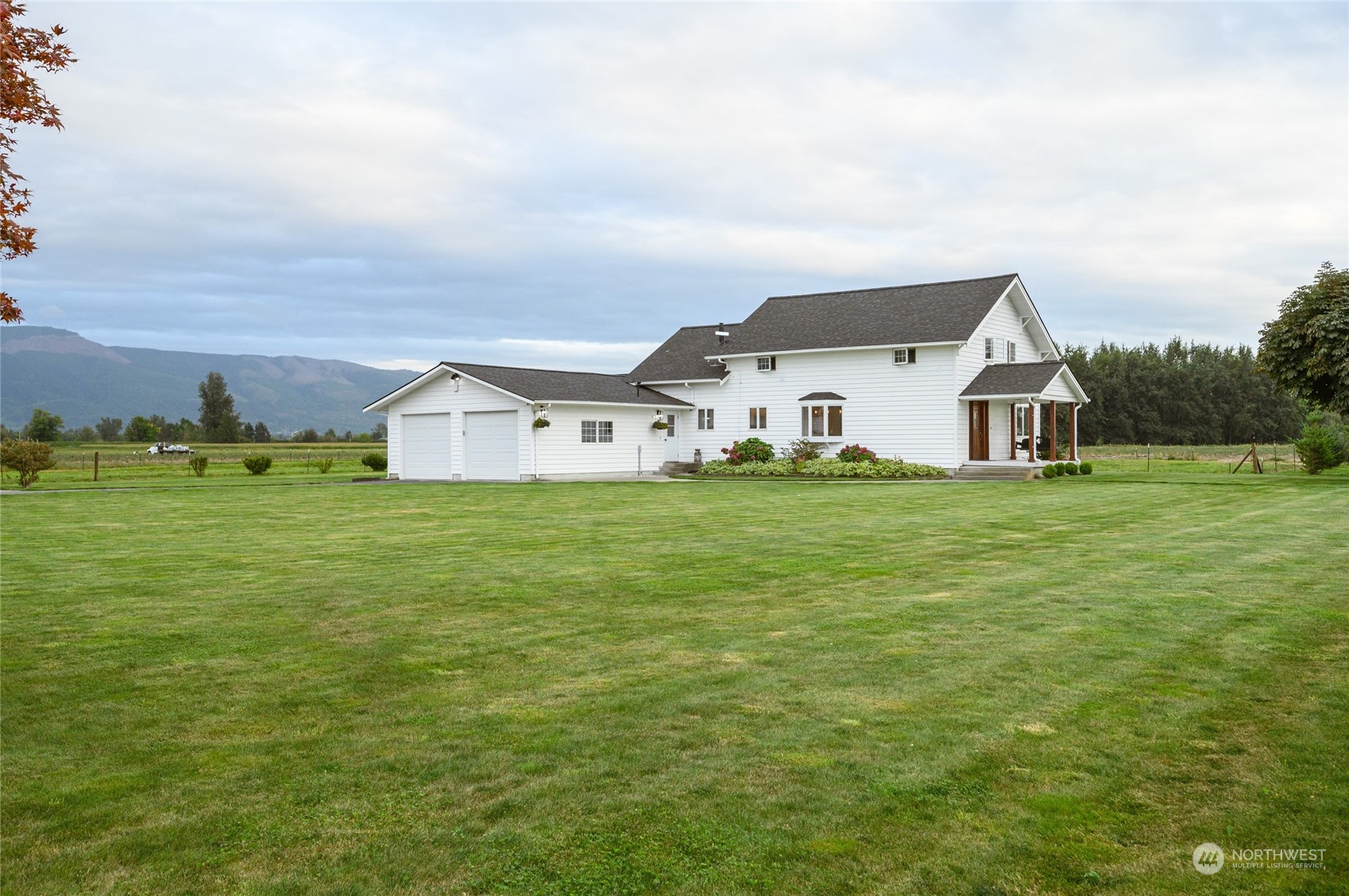 7956 Trapline Road Everson, WA 98247 - Photo 4 of 40 a house view with a garden space