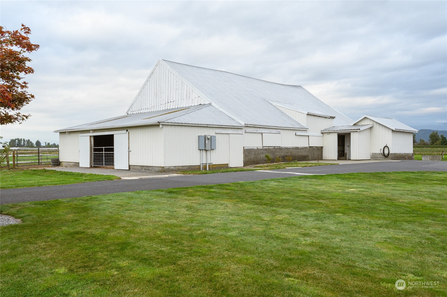 7956 Trapline Road Everson, WA 98247 - Photo 5 of 40 a front view of a house with a garden
