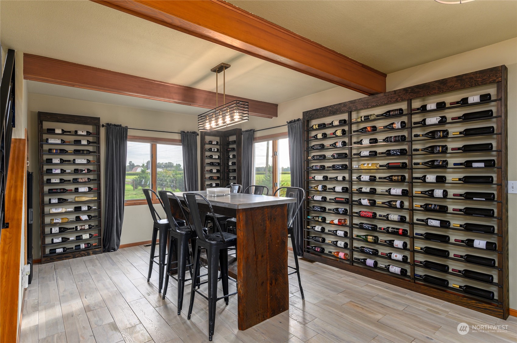 7956 Trapline Road Everson, WA 98247 - Photo 6 of 40 a view of a dining room with furniture and chandelier