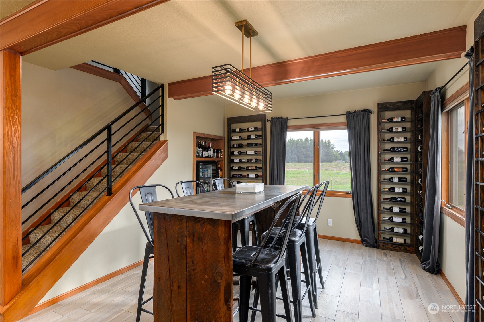 7956 Trapline Road Everson, WA 98247 - Photo 8 of 40 a dining room with furniture window and wooden floor